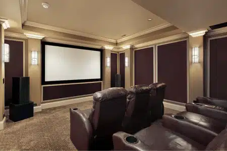 A luxurious private screening room showcases the immersive home theater benefits for families