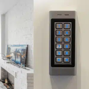 Wall-mounted keypad in living room shows how intercom works for home security