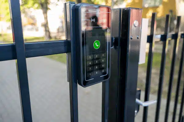 Gate Access Keypad wireless home intercom systems keypad mounted on metal gate controls visitor access at secure entrance